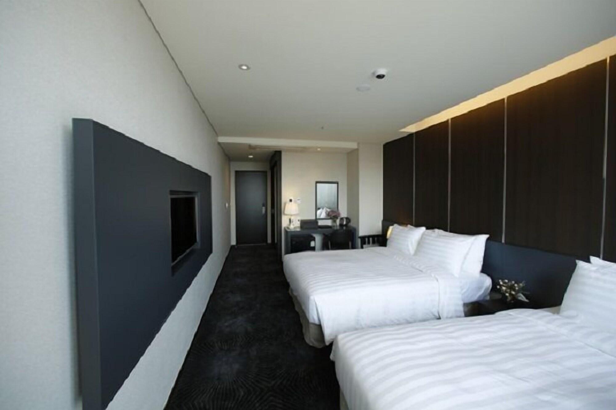 Golden Daisy Hotel Seogwipo Bagian luar foto