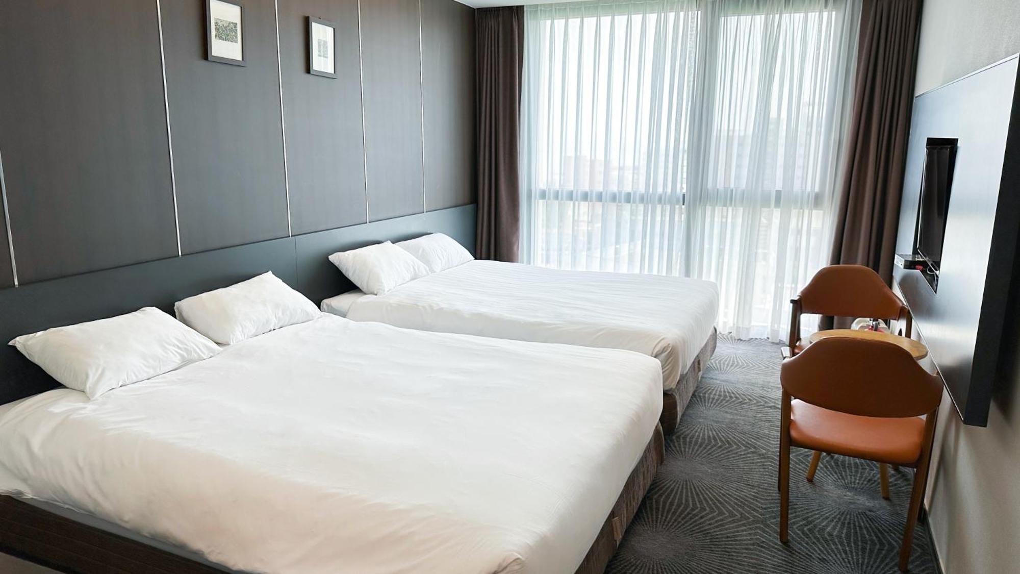 Golden Daisy Hotel Seogwipo Ruang foto