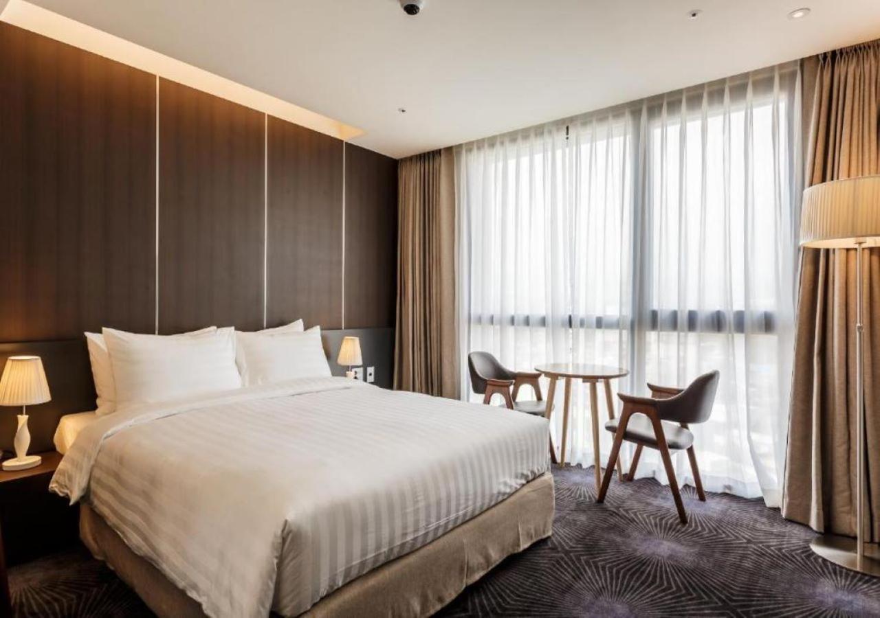 Golden Daisy Hotel Seogwipo Bagian luar foto