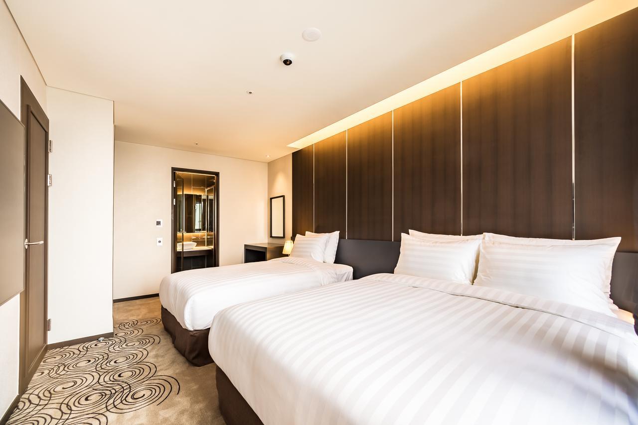 Golden Daisy Hotel Seogwipo Bagian luar foto