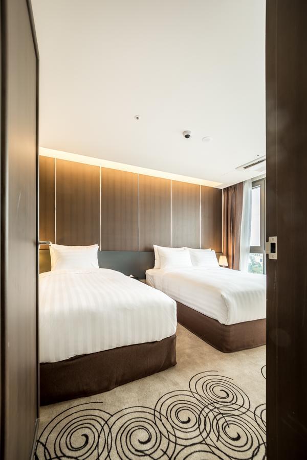 Golden Daisy Hotel Seogwipo Bagian luar foto